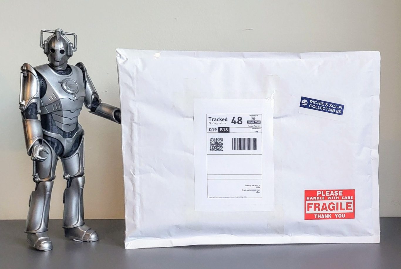 A package ready to be posted by a Cyberman!